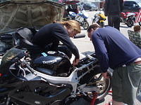 It wouldn't be a track day if Morgi and CW aren't wrenching...